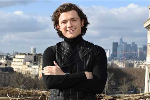 Tom Holland Goes Pinstriped In Paris For Final Uncharted Tour Stop