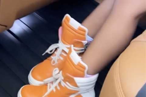 Kylie Jenner shows off daughter Stormi’s $500 sneakers in $200K Range Rover after fans slam mogul..