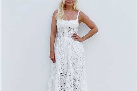 Holly Willoughby looks stunning as she shows off her new hair in a white dress on holiday