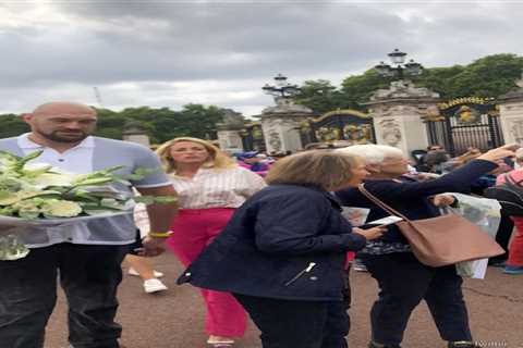 Tyson Fury and wife Paris in sweet tribute to The Queen as they lay flowers at the gates of..