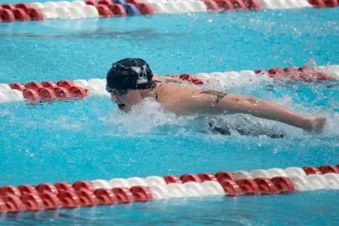 Transgender male swimmer struggling against new competition after earning All-American honors as..