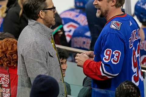 Ryan Reynolds, Alexander Skarsgård kiss Henrik Lundqvist at Rangers game