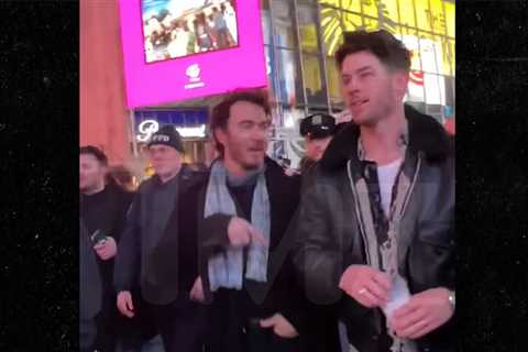 Jonas Brothers Swarmed by Fans in Time Square