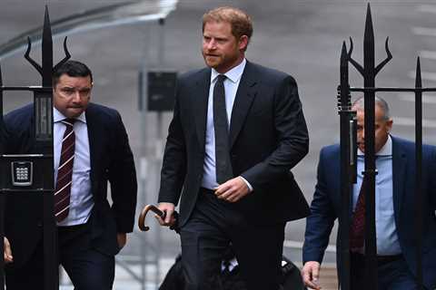 Prince Harry arrives for second day in court flanked by security after jetting into London for..