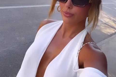 Towie’s Amber Turner goes braless in white dress as she shows Dan Edgar what he’s missing