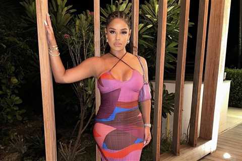 You Ask, We Answer: Taina Williams Vacationed in an Abstract Pretty Little Thing Pleated Dress