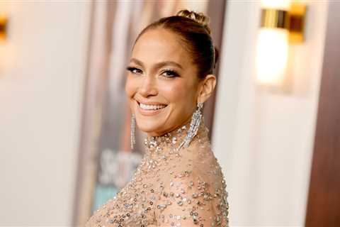 Jennifer Lopez Enjoys the Fourth of July Lounging in Pink Swimsuit