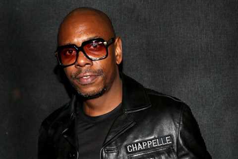 Hot 100 First-Timers: Dave Chappelle Charts Thanks to Travis Scott Feature on ‘Parasail’