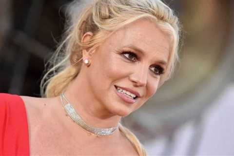 Britney Spears Embraces the Holiday Spirit While Flaunting Revealing Cutout Dress