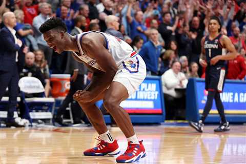 KJ Adams helps lift Kansas over No. 4 UConn a day before his mother’s funeral