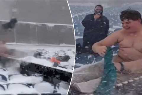 Shirtless fan slides down snow trough at Bills’ stadium during cleanup for playoff game