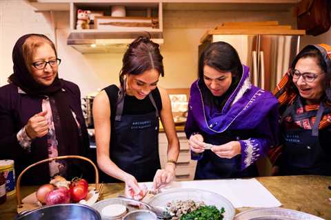 Meghan Markle cooks traditional Afghan food with refugees in heartwarming evening