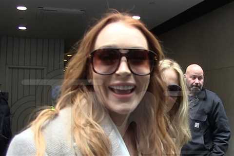 Lindsay Lohan Gets A-List Treatment on Movie Promo Tour, Signs Autographs