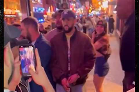 Bad Bunny Looks Miserable As He's Mobbed By Nashville Fans Taking Pics
