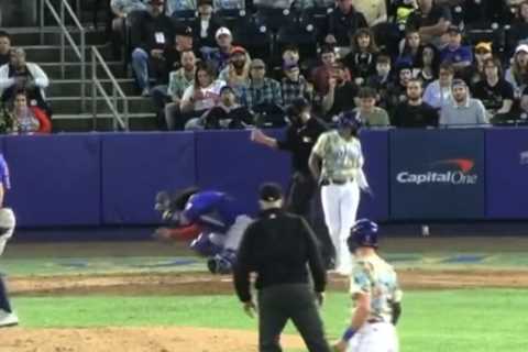 Triple-A game ends after catcher takes backswing to head in scary scene