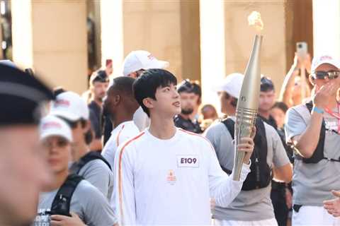 Musicians Who’ve Carried the Olympic Torch: BTS’ Jin, John Legend & More