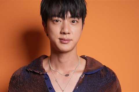 BTS Jin’s Gucci Sweater With a Plunging Neckline Commands Attention