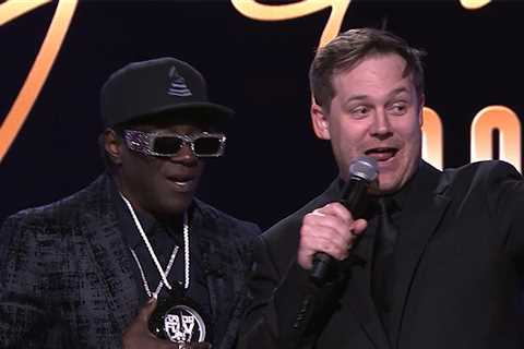 Flavor Flav Spontaneously Auctions Clock Off His Neck for $15,000