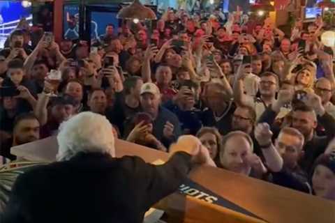 Robert Kraft takes shot with Patriots fans at London bar in wild scene