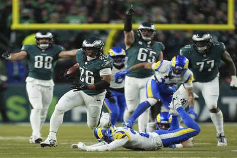 Saquon Barkley’s monster game sends Eagles to NFC Championship as Rams’ rally falls short in snow
