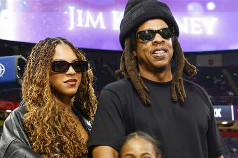 Jay-Z Has Fun with Daughters Blue Ivy and Rumi on Super Bowl Sidelines