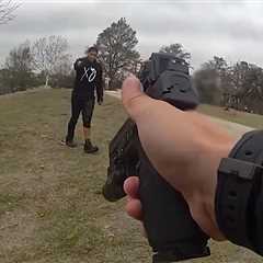 Police Officer Begs Man to Put Down Knife After He Climbs Out of Car in Lake, on Video