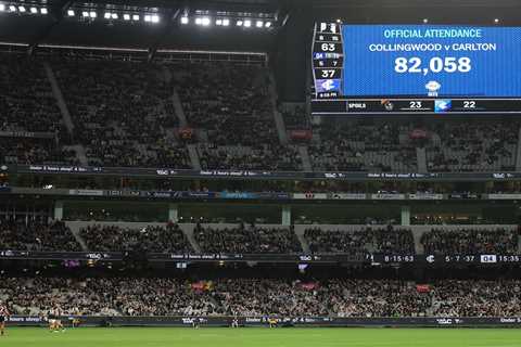 Two men allegedly brought guns into Australian Football League match with 82,000 in attendance