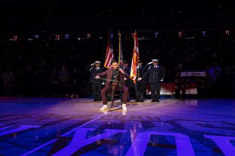 Rebound! NYC subway cellist was attacked by unhinged woman plays national anthem for Knicks