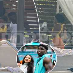 Tyreek Hill gets flirty with mystery woman in pool after wife’s divorce filing