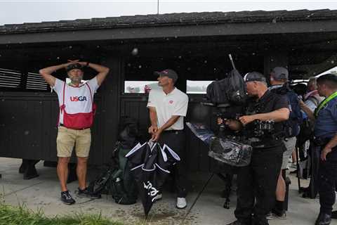 Final round of US Open in weather delay as rain soaks Oakmont