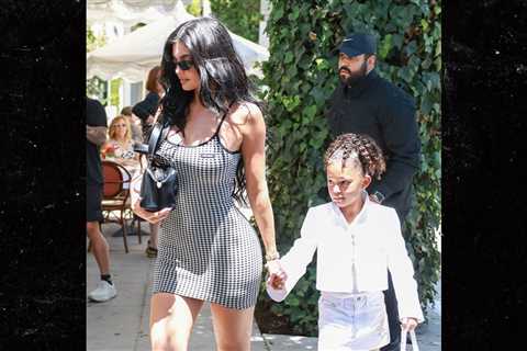 Kylie Jenner and Daughter Stormi Hold Hands on Way to Birthday Party