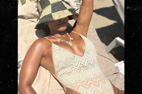 Guess Which Sexy Singer 'Dipped It Low' in This Hot Shot!
