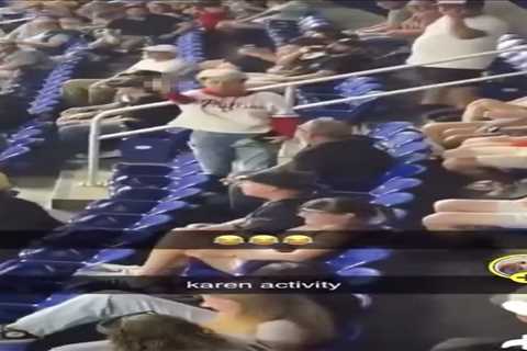 Defiant Phillies fan flips off crowd after taking ball from young boy, father