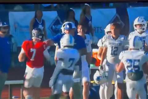 High school coach shoves opposing QB to spark wild sideline fight during state championship game