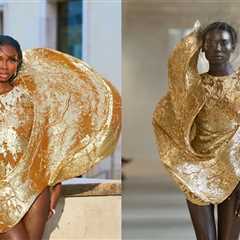 Olandria in a Gold Sculptural Rahul Mishra Couture Gown at Paris Fashion Week