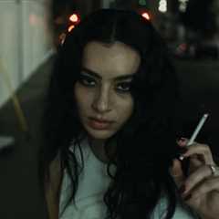 Charli xcx’s ‘Brat’ Era Is a ‘Dead Horse’ She Can’t Stop Beating in ‘Residue’ Video Featuring a..