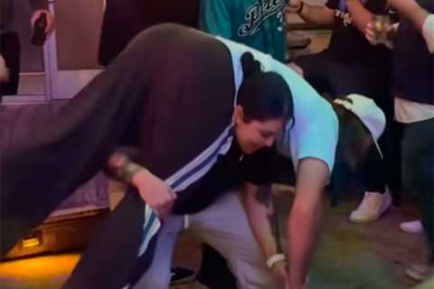 Trevor Lawrence squatted by Jaguars fan in bizarre bar scene