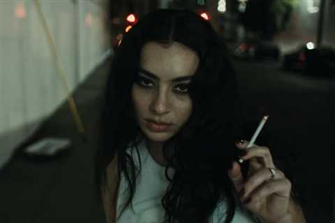 Charli xcx’s ‘Brat’ Era Is a ‘Dead Horse’ She Can’t Stop Beating in ‘Residue’ Video Featuring a..