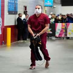 Patriots’ Mack Hollins arrives at Super Bowl 2026 in prison jumpsuit and shackles in wild look