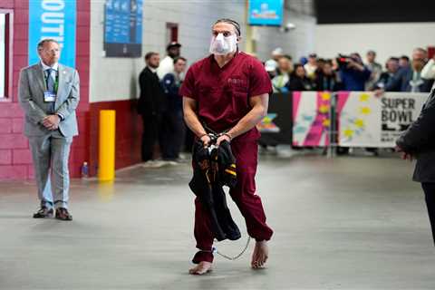 Patriots’ Mack Hollins arrives at Super Bowl 2026 in prison jumpsuit and shackles in wild look