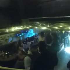 Police bodycam footage shows Patriots’ AFC championship party with strippers, hookah and dollar..