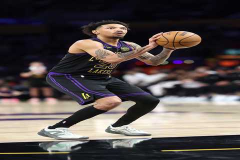 Lakers convert Nick Smith Jr. to standard contract, making guard playoff-eligible