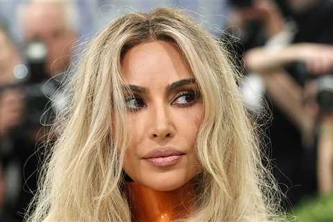 Kim Kardashian Shows Off Bleach Blonde Hairdo, Cleavage in Sexy Post