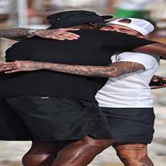 Michael Jordan hugs David Beckham during luxurious Ibiza vacation with their wives