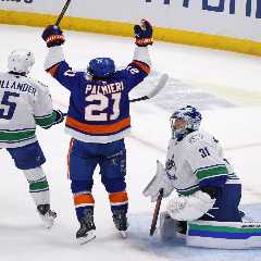 Islanders slip past Canucks thanks to Kyle Palmieri’s two-goal night